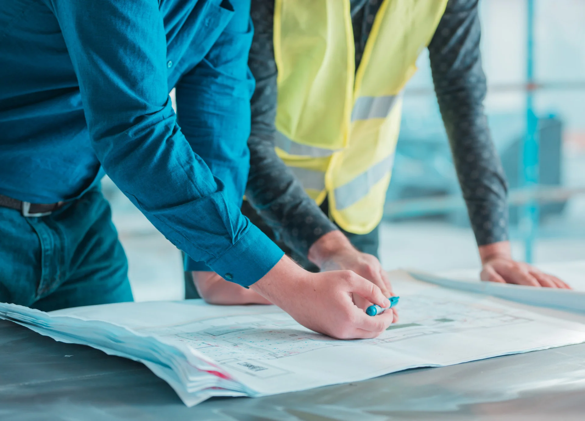 workers checking out architectural plan project